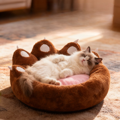 Plush Cat Paw Bed - Deep Sleep Comfort featuring a cozy brown design and a fluffy cat sleeping peacefully.