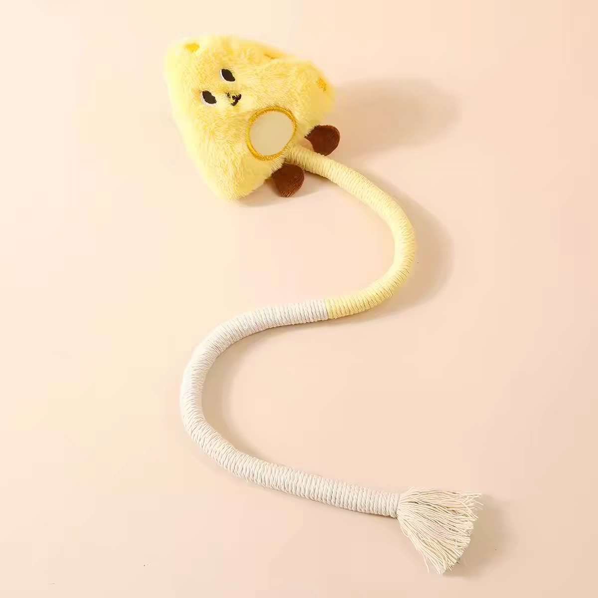 Yellow plush character cat chew toy made with a long cotton rope