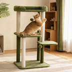 Golden cat on the middle woven platform of a green cat tree, reaching towards a rope-wrapped scratching post.