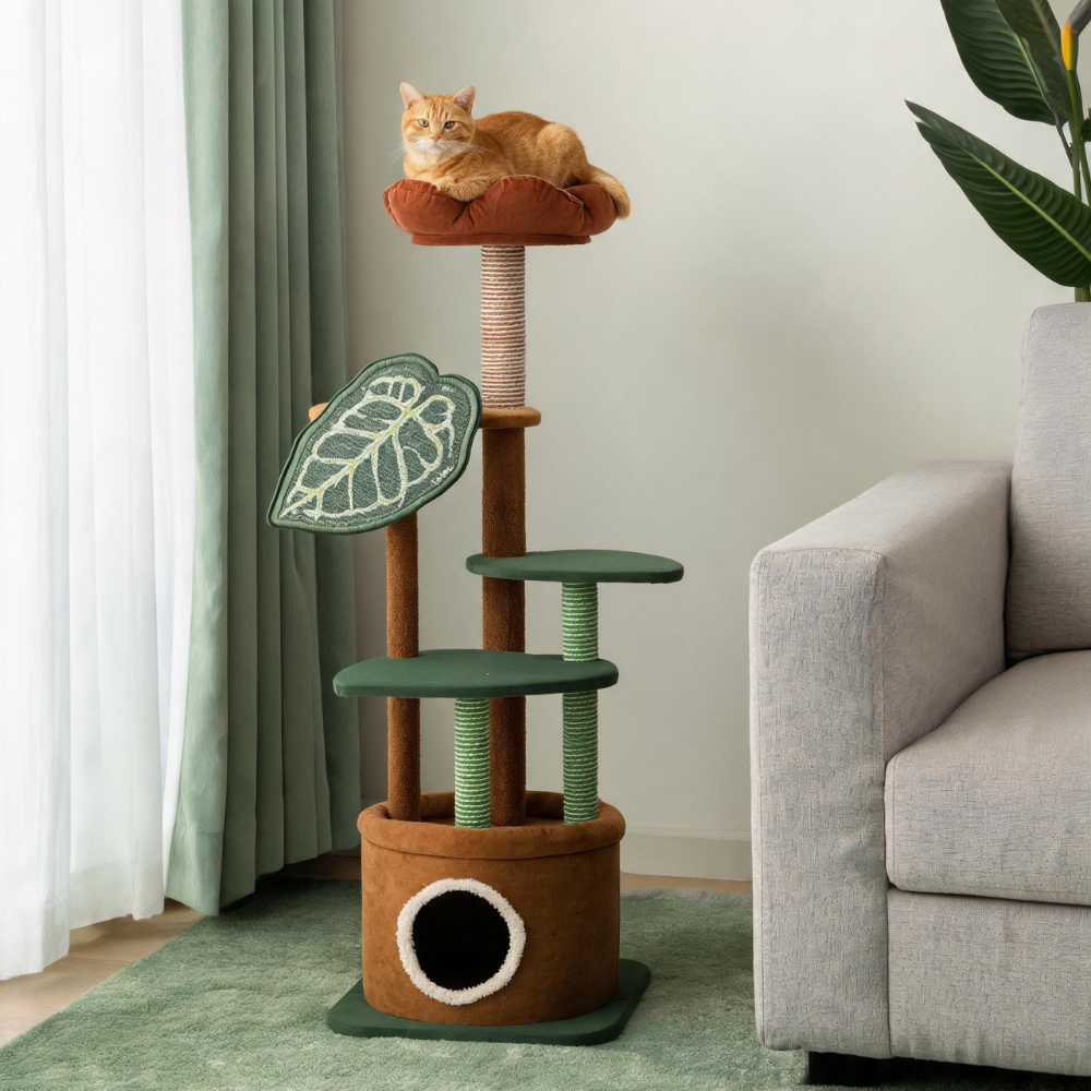 Ginger cat lounging on a flower-shaped top perch above green platforms and a leaf-shaped scratching panel.
