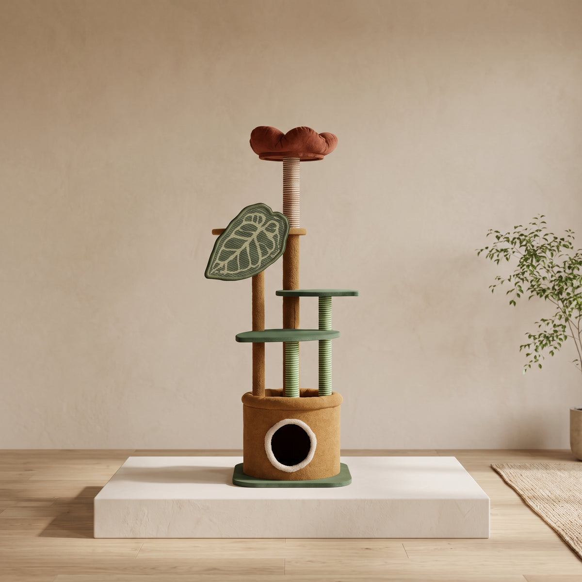 Botanical cat tree displayed on a white plinth, showing its flower perch, green platforms and plant-pot-style hideaway.