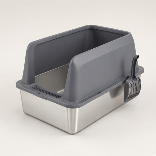 Grey stainless steel cat litter box with high sides and a scoop clipped on, three-quarter view